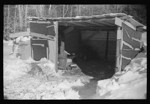Lumbermen's shack where they can get warm, eat their lunch, and house the tractor with which they haul logs to the road where they are picked up and hauled to the mill by truck. Near Barnard, Windsor County, Vermont