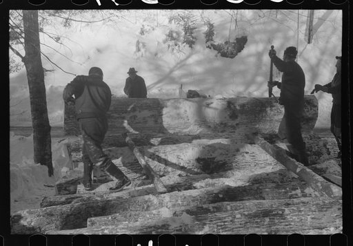 Untitled photo, possibly related to: Hauling timber by tractor to the road where it is taken by truck to the mill. Near Barnard, Vermont