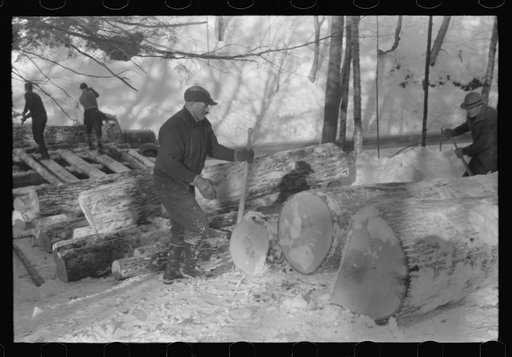 Untitled photo, possibly related to: Hauling timber by tractor to the road where it is taken by truck to the mill. Near Barnard, Vermont