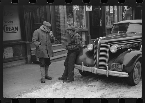 Untitled photo, possibly related to: Townspeople of Woodstock, Vermont discussing the severe winter on the street corner in center of town