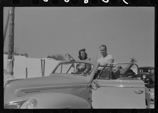 Untitled photo, possibly related to: On Saturday afternoon many high school students come to Dickinson's farm to ski. Mr Dickenson built a ski tow on his farm three years ago at a cost of one thousand dollars. This is the first year he had made any money, although business is increasing rapidly now.