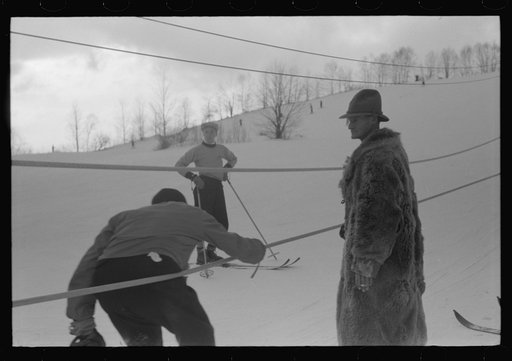 Untitled photo, possibly related to: On Saturday afternoon many high school students come to Dickinson's farm to ski. Mr Dickenson built a ski tow on his farm three years ago at a cost of one thousand dollars. This is the first year he had made any money, although business is increasing rapidly now.