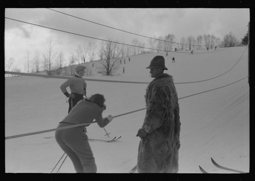 Untitled photo, possibly related to: On Saturday afternoon many high school students come to Dickinson's farm to ski. Mr Dickenson built a ski tow on his farm three years ago at a cost of one thousand dollars. This is the first year he had made any money, although business is increasing rapidly now.