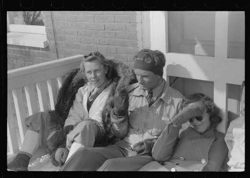 Skiers on porch of Mr. Dickinson's home in Lisbon near Franconia, New Hampshire