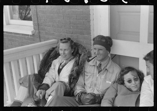 Untitled photo, possibly related to: Skiers on porch of Mr. Dickinson's home in Lisbon near Franconia, New Hampshire