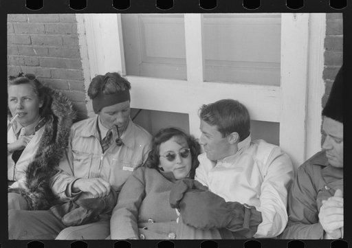 Untitled photo, possibly related to: Skiers on porch of Mr. Dickinson's home in Lisbon near Franconia, New Hampshire