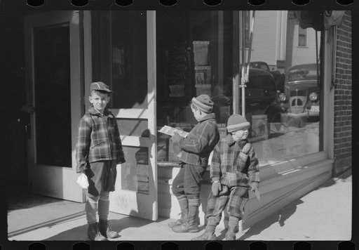 Children waiting to go into movie on Saturday afternoon. Littleton, New Hampshire