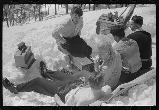 Untitled photo, possibly related to: Skiers relaxing in the sun during noon hour outside of forest ranger's hut near the top of Mount Mansfield, Smuggler's Notch, near Stowe, Vermont