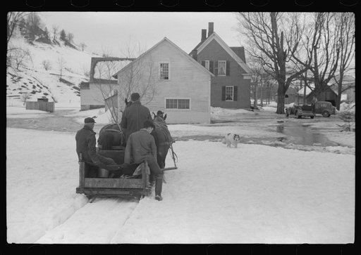 Clinton Gilbert and hired men driving back to barn after coming from tapping sugar maple trees for sap which is boiled down into maple syrup. Gilbert farm, near Woodstock, Vermont