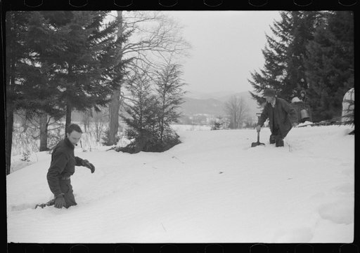 Untitled photo, possibly related to: Walter Gaylord and son on sled with vat full of sap from sugar maple trees which is boiled down into syrup. Mad River Valley, Waitesfield, Vermont. He averages about 150 gallons of syrup annually, this year tapped only 600 out of his 1000 trees, because of unusua