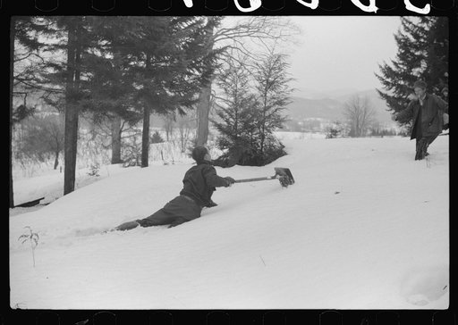Untitled photo, possibly related to: Walter Gaylord and son on sled with vat full of sap from sugar maple trees which is boiled down into syrup. Mad River Valley, Waitesfield, Vermont. He averages about 150 gallons of syrup annually, this year tapped only 600 out of his 1000 trees, because of unusua