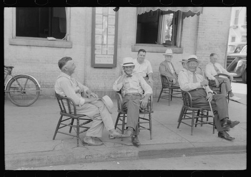 Untitled photo, possibly related to: Farmers exchanging news and greetings on Saturday afternoon in front of courthouse. Versailles, Kentucky