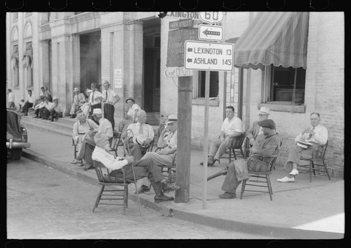 Untitled photo, possibly related to: Farmers exchanging news and greetings on Saturday afternoon in front of courthouse. Versailles, Kentucky