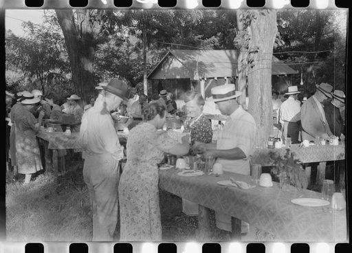 Untitled photo, possibly related to: Priest talking to one of the parishioners before a church supper. Near Bardstown, Kentucky