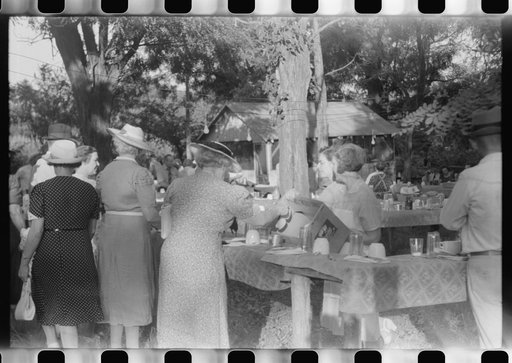 Untitled photo, possibly related to: Priest talking to one of the parishioners before a church supper. Near Bardstown, Kentucky