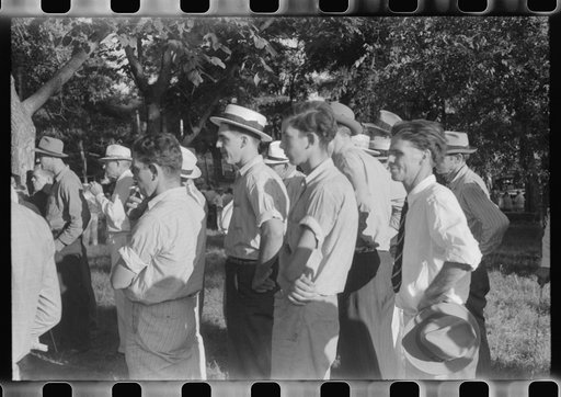 Untitled photo, possibly related to: Priest talking to one of the parishioners before a church supper. Near Bardstown, Kentucky