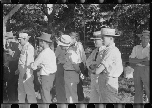 Untitled photo, possibly related to: Priest talking to one of the parishioners before a church supper. Near Bardstown, Kentucky