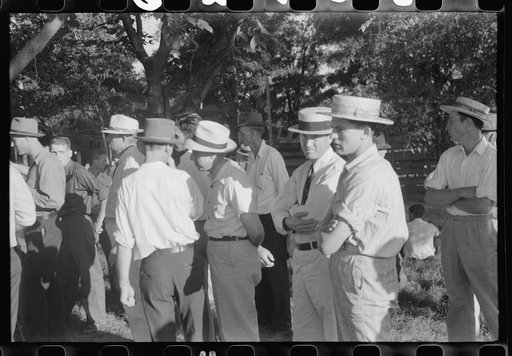 Untitled photo, possibly related to: Priest talking to one of the parishioners before a church supper. Near Bardstown, Kentucky