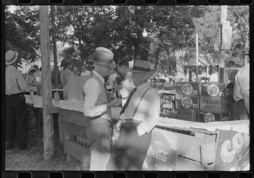 Untitled photo, possibly related to: Priest talking to one of the parishioners before a church supper. Near Bardstown, Kentucky