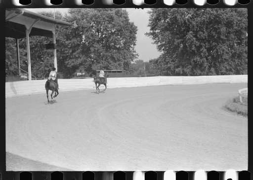 Untitled photo, possibly related to: Spectators at Shelby County Horse Show and Fair. Shelbyville, Kentucky