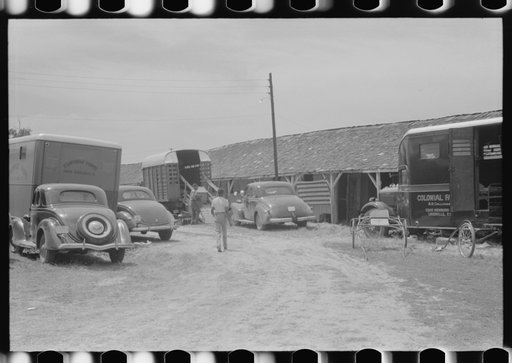 Untitled photo, possibly related to: Unloading truck which transports horses and equipment. Shelby County Horse Show and Fair, Shelbyville, Kentucky