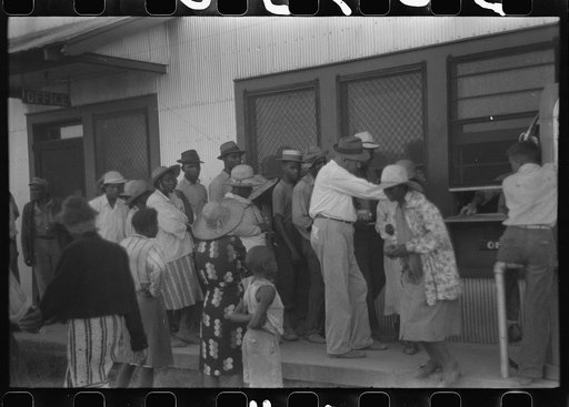 Untitled photo, possibly related to: Day laborers who have just been paid off for hoeing cotton on the Hopson Plantation near Clarksdale, Mississippi Delta, Mississippi