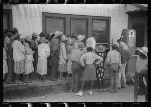 Untitled photo, possibly related to: Day laborers who have just been paid off for hoeing cotton on the Hopson Plantation near Clarksdale, Mississippi Delta, Mississippi