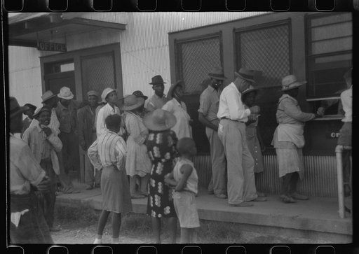 Untitled photo, possibly related to: Day laborers who have just been paid off for hoeing cotton on the Hopson Plantation near Clarksdale, Mississippi Delta, Mississippi