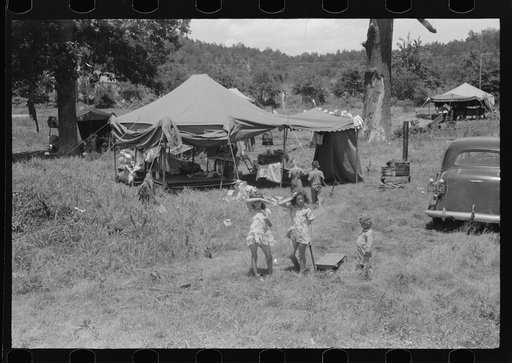 Untitled photo, possibly related to: Itinerant repair man with family who goes around to the different farmers to mend their stoves. Near Lawrenceburg, Kentucky
