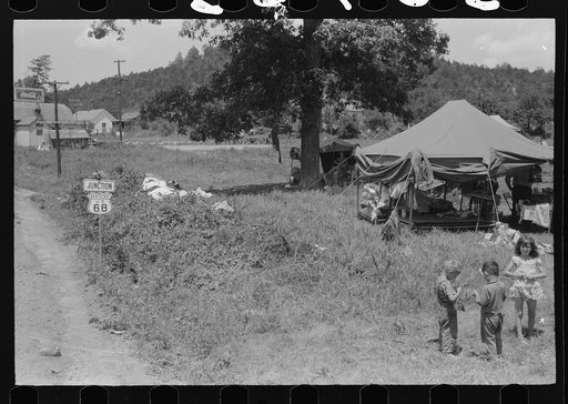 Untitled photo, possibly related to: Itinerant repair man with family who goes around to the different farmers to mend their stoves. Near Lawrenceburg, Kentucky
