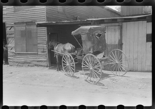Untitled photo, possibly related to: Blacksmith shoeing team of farmhorses on Saturday, Russellville, Kentucky