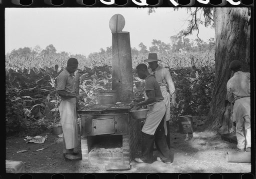 Untitled photo, possibly related to: Cooking fried supper for a benefit picnic supper on the grounds of St. Thomas' Church. Near Bardstown, Kentucky