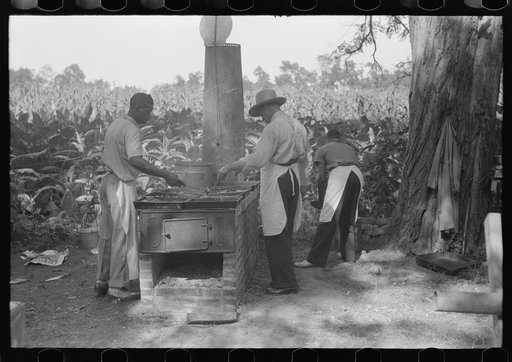 Cooking fried supper for a benefit picnic supper on the grounds of St. Thomas' Church. Near Bardstown, Kentucky