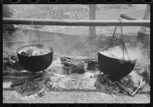 Barbecuing beef and lamb for a benefit picnic supper on the grounds of St. Thomas' Church. Near Bardstown, Kentucky
