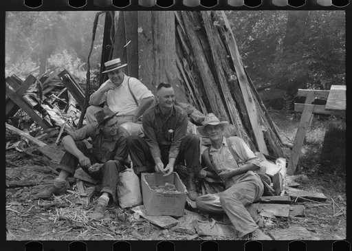 Untitled photo, possibly related to: Parishoners peeling potatoes for a benefit picnic supper on the grounds of St. Thomas' Church. Near Bardstown, Kentucky