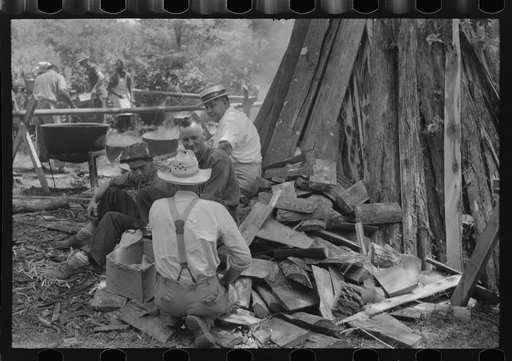 Untitled photo, possibly related to: Parishoners peeling potatoes for a benefit picnic supper on the grounds of St. Thomas' Church. Near Bardstown, Kentucky