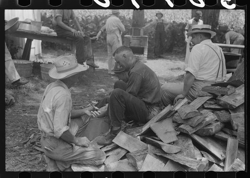 Untitled photo, possibly related to: Parishoners peeling potatoes for a benefit picnic supper on the grounds of St. Thomas' Church. Near Bardstown, Kentucky