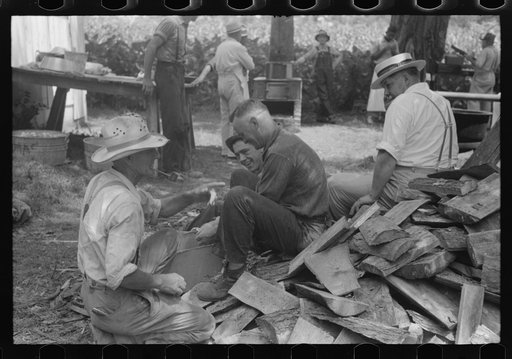 Untitled photo, possibly related to: Parishoners peeling potatoes for a benefit picnic supper on the grounds of St. Thomas' Church. Near Bardstown, Kentucky