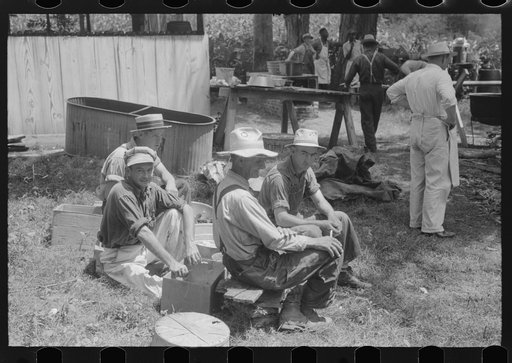 Untitled photo, possibly related to: Parishoners peeling potatoes for a benefit picnic supper on the grounds of St. Thomas' Church. Near Bardstown, Kentucky