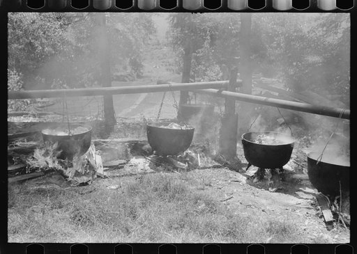 Barbecueing beef and lamb for a benefit picnic supper on the grounds of St. Thomas' Church. Near Bardstown, Kentucky