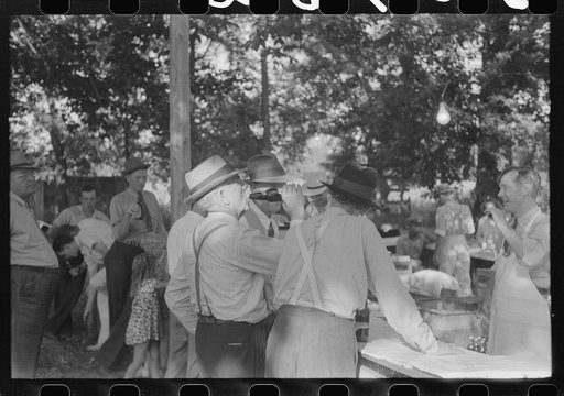 Untitled photo, possibly related to: "Ball-throwing game" on the grounds of St. Thomas Church at a benefit picnic supper. Near Bardstown, Kentucky