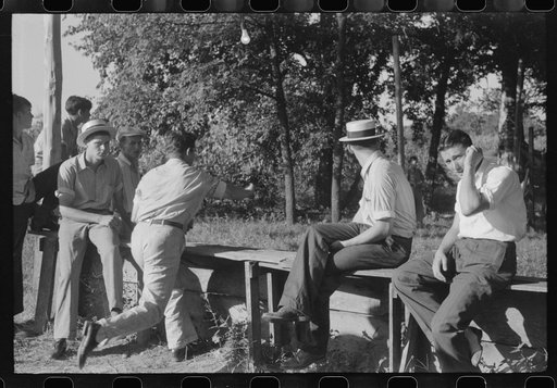 Untitled photo, possibly related to: "Ball-throwing game" on the grounds of St. Thomas Church at a benefit picnic supper. Near Bardstown, Kentucky