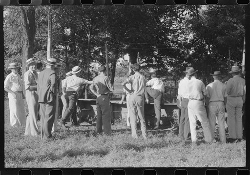 Untitled photo, possibly related to: "Ball-throwing game" on the grounds of St. Thomas Church at a benefit picnic supper. Near Bardstown, Kentucky
