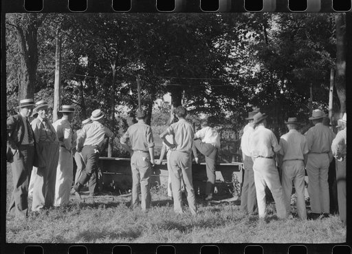 Untitled photo, possibly related to: "Ball-throwing game" on the grounds of St. Thomas Church at a benefit picnic supper. Near Bardstown, Kentucky