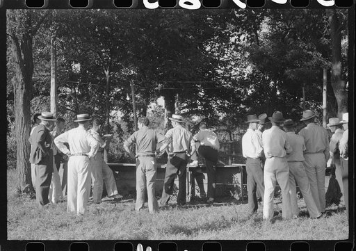 Untitled photo, possibly related to: "Ball-throwing game" on the grounds of St. Thomas Church at a benefit picnic supper. Near Bardstown, Kentucky