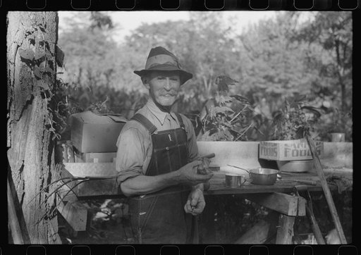 Untitled photo, possibly related to: Picnicker peeling apple at St. Thomas church supper, near Bardstown, Kentucky