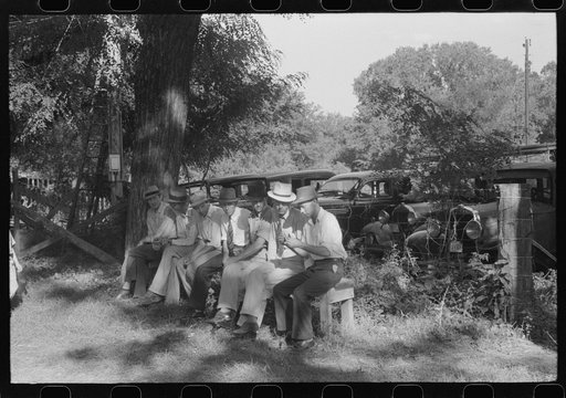 Untitled photo, possibly related to: Parishoners gossiping while waiting for picnic supper at St. Thomas Church Picnic near Bardstown, Kentucky