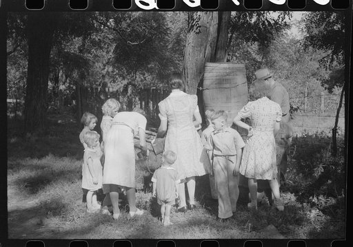 Untitled photo, possibly related to: Parishoners gossiping while waiting for picnic supper at St. Thomas Church Picnic near Bardstown, Kentucky