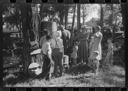 Untitled photo, possibly related to: Children getting a drink of water at church picnic at St. Thomas Church, near Bardstown, Kentucky