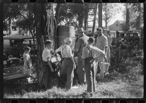Untitled photo, possibly related to: Children getting a drink of water at church picnic at St. Thomas Church, near Bardstown, Kentucky